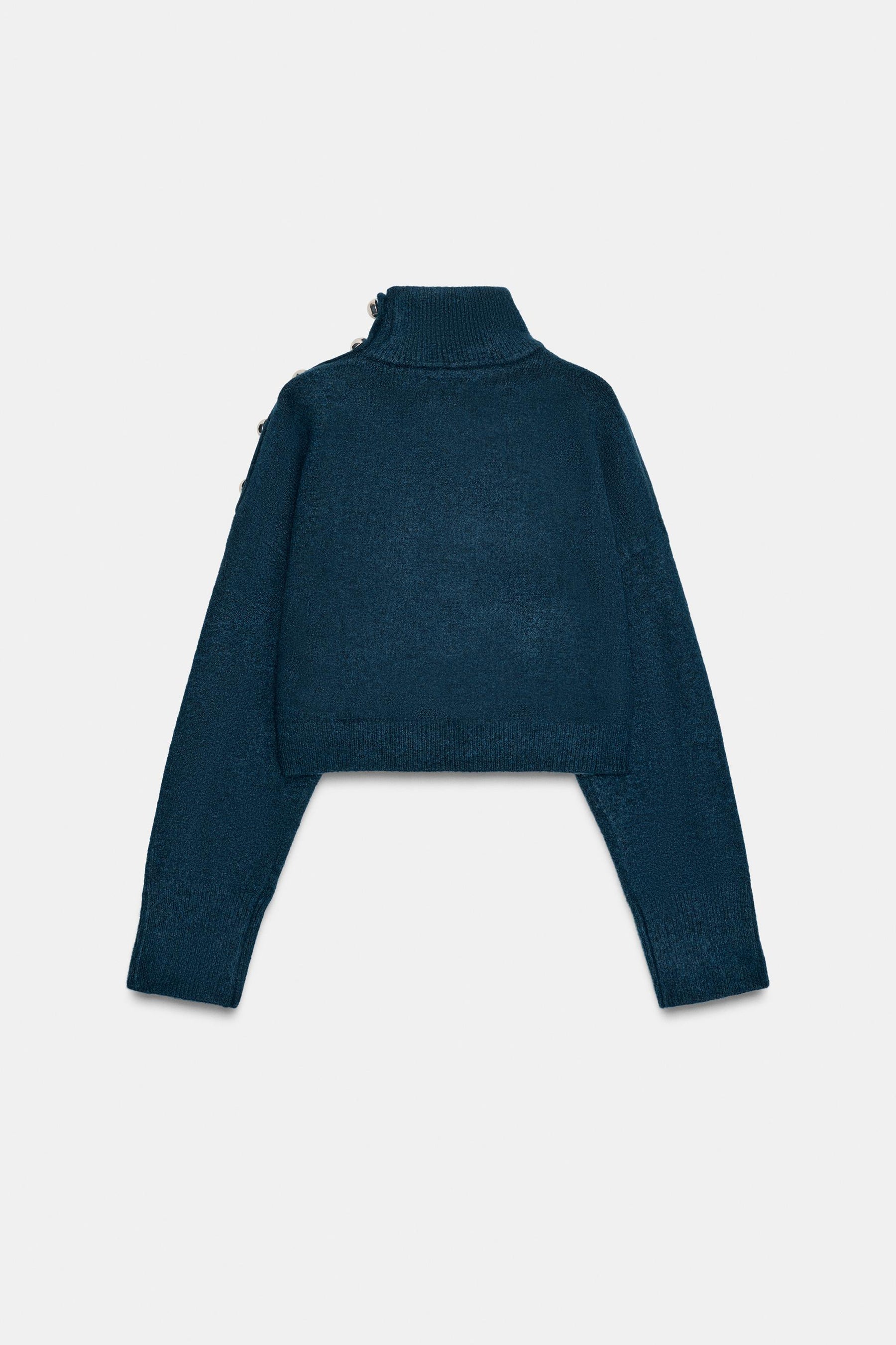 Weicher Strickpullover mit Knöpfen