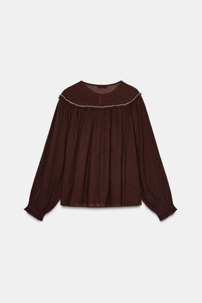 Bestickte Perlenbluse