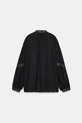 Perlenbesetzte, halbtransparente Bluse