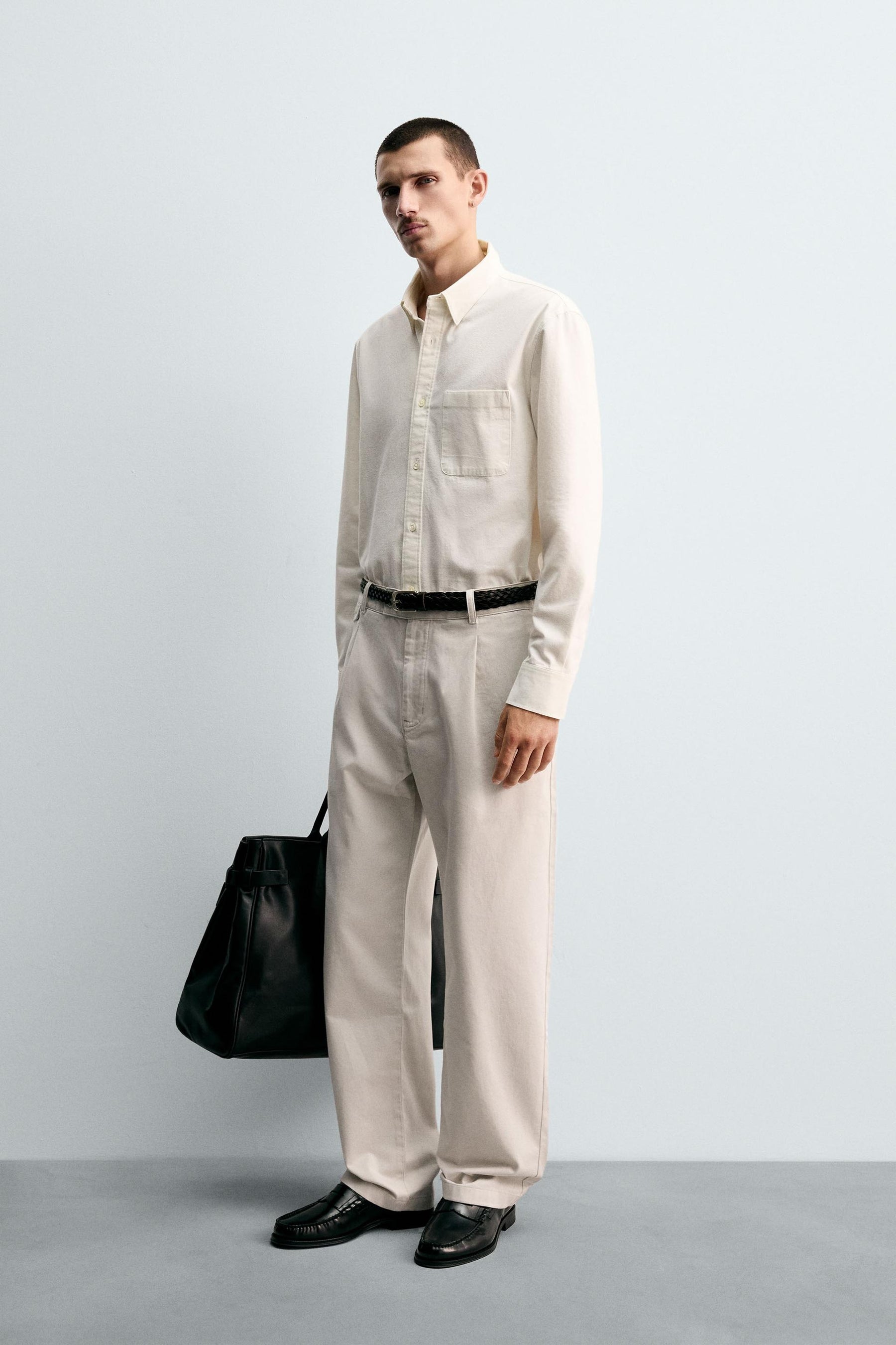RELAXED FIT PLEATED TROUSERS - Image 1