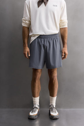CONTRAST PERFORATED SHORTS - Image 2
