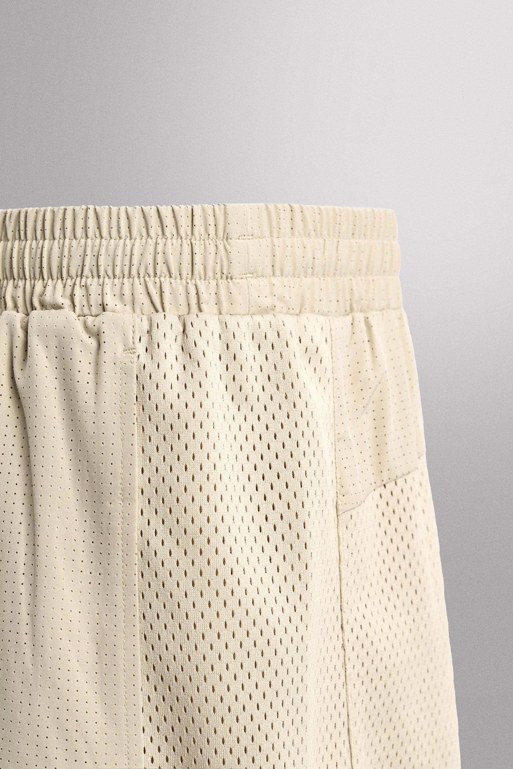 CONTRAST PERFORATED SHORTS - Image 9