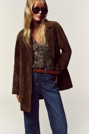 Schlagjeans mit hohem Bund