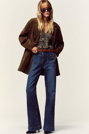 Schlagjeans mit hohem Bund