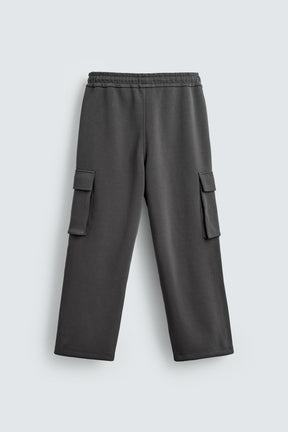 NEOPRENE-EFFECT PLEATED CARGO TROUSERS - Image 6
