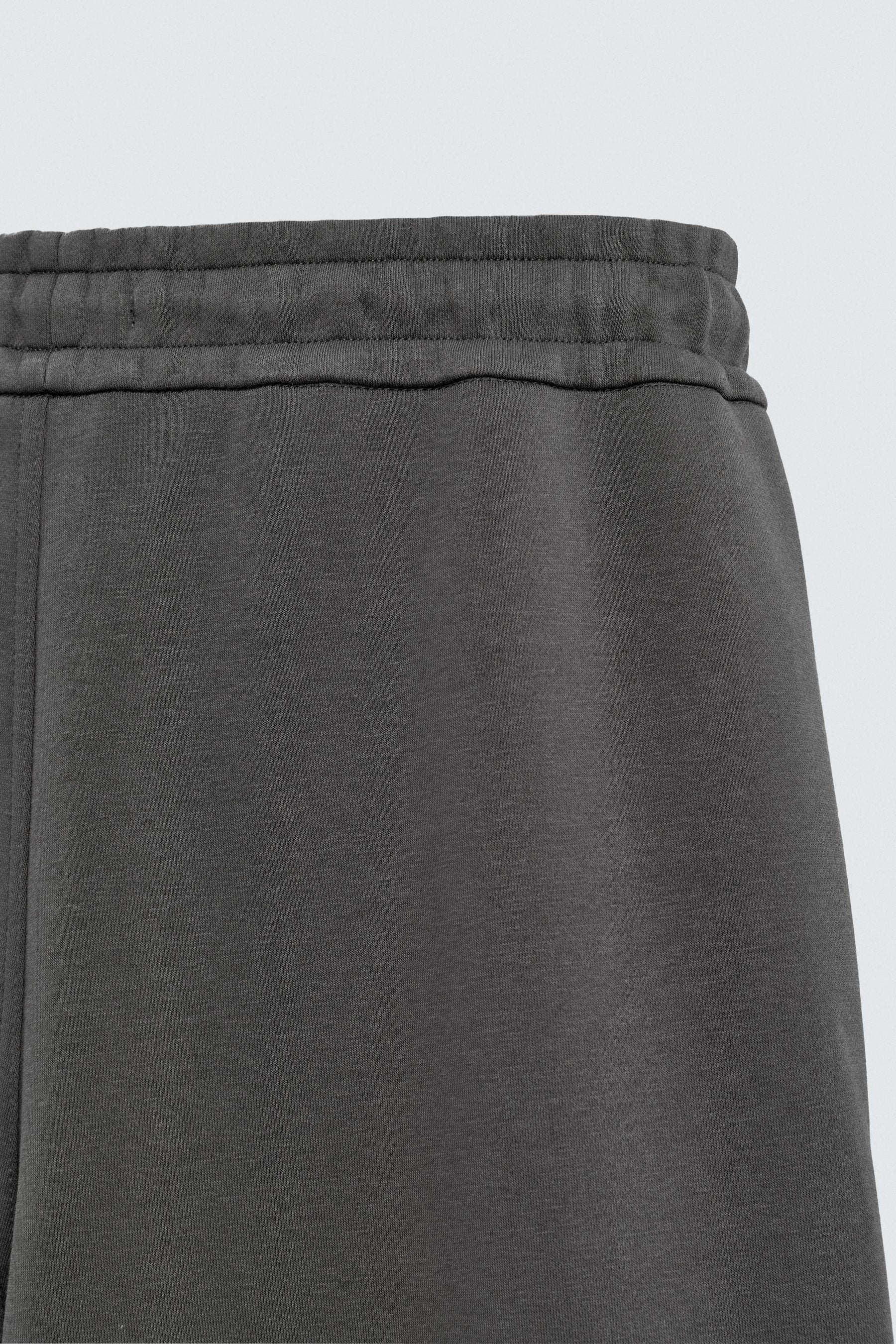 NEOPRENE-EFFECT PLEATED CARGO TROUSERS - Image 8