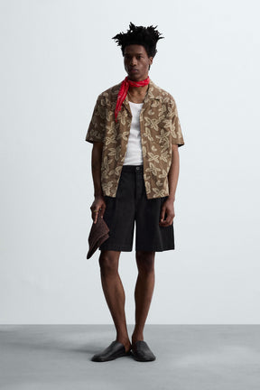 RELAXED FIT BERMUDA SHORTS WITH PLEATS - Image 1