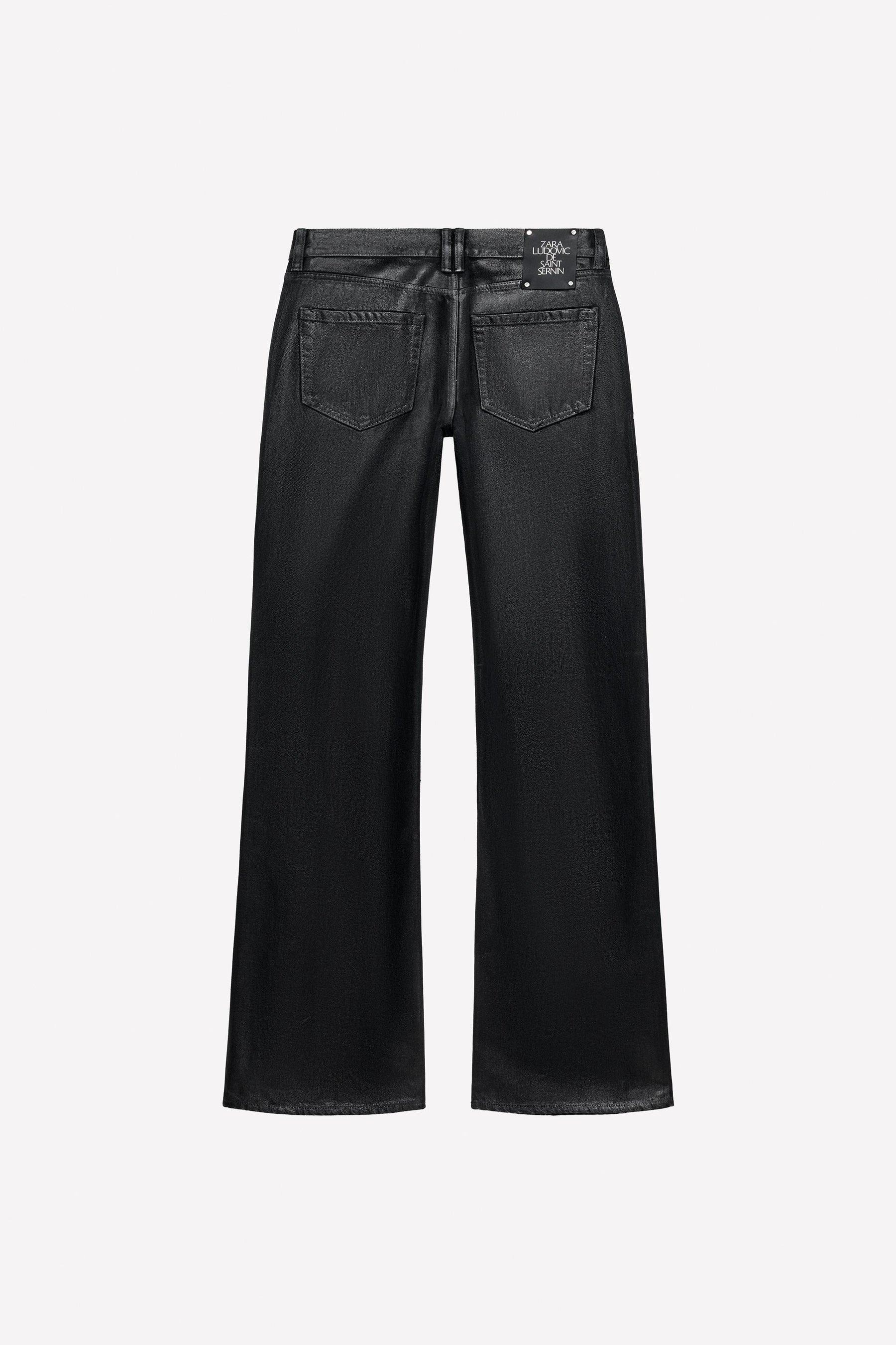 Gewachste Bootcut-Jeans mit niedrigem Bund