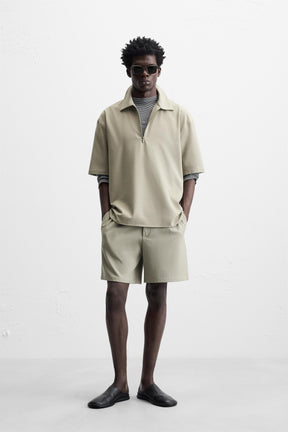 TECHNICAL ZIP-UP POLO SHIRT - Image 1