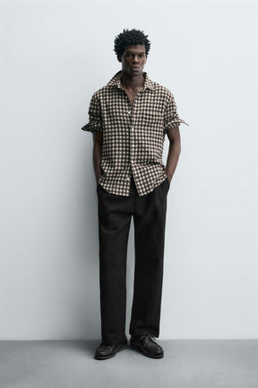 PLEATED RELAXED FIT TROUSERS - Image 1