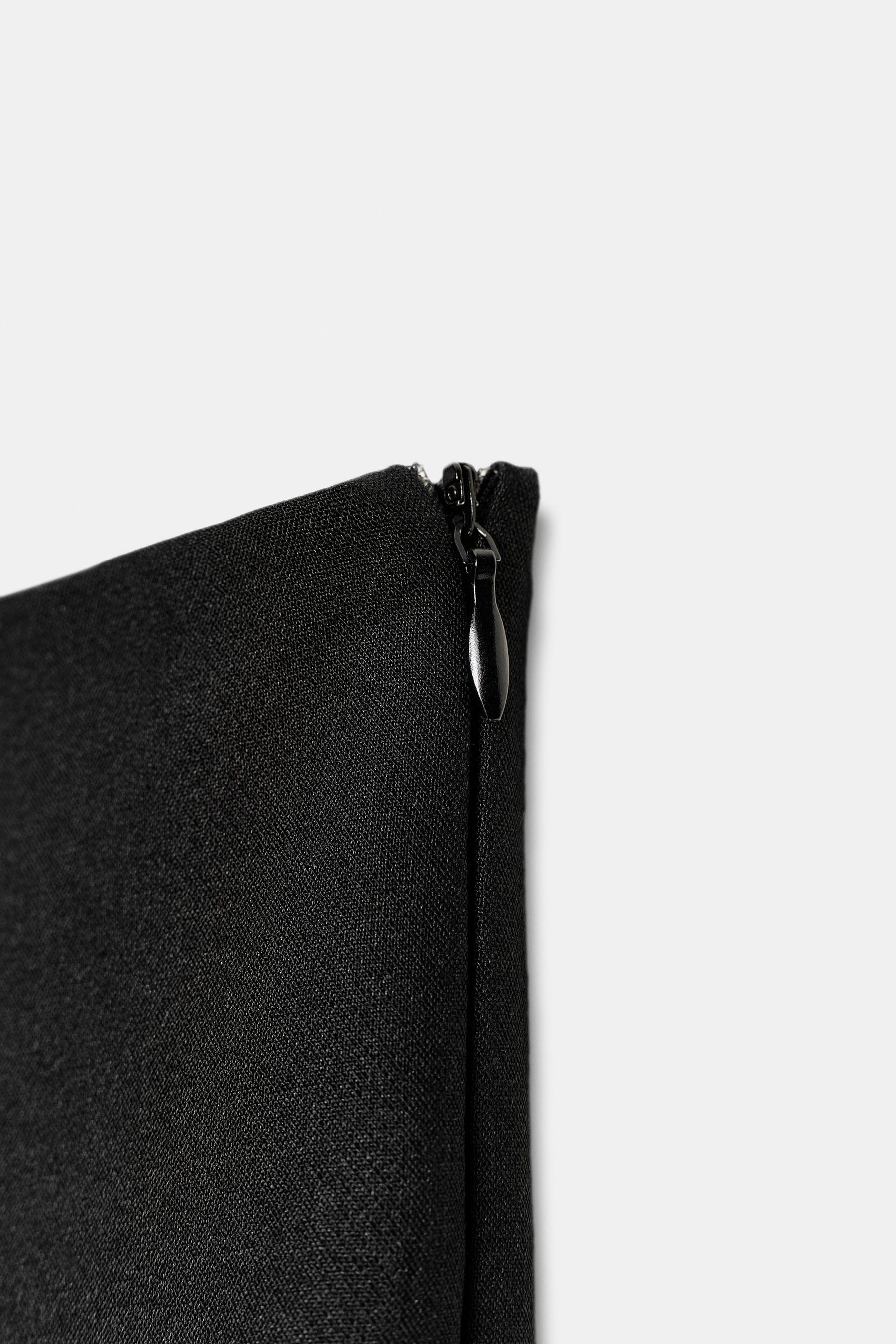 Schlaghosen mit Schlitzen