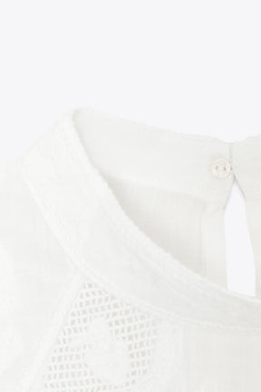 BLUSE MIT BLUMENSTICKUNG