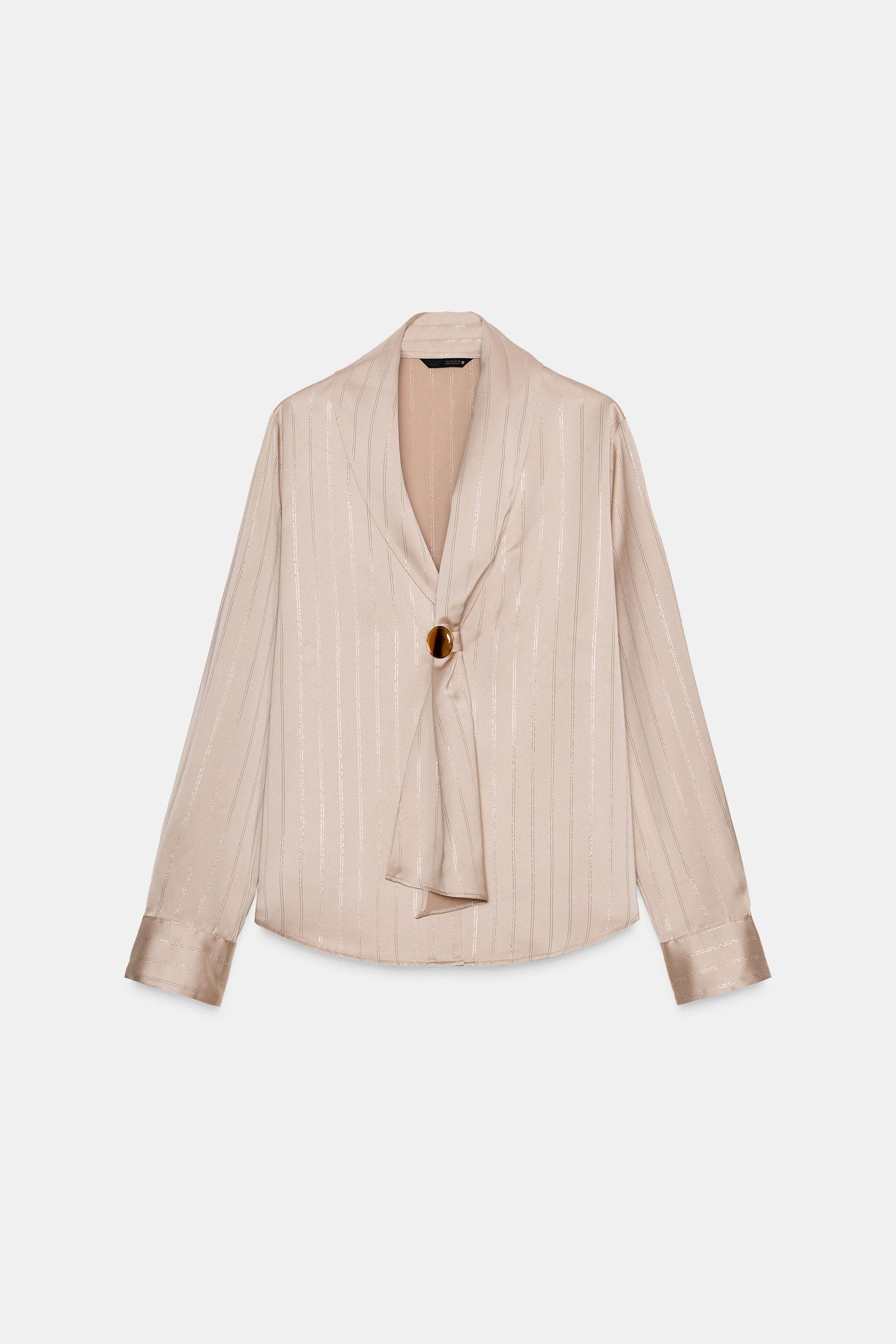 Bluse mit Metallic-Applikationen