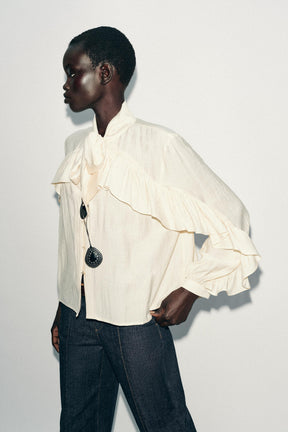 Rüschenbluse mit Schleife