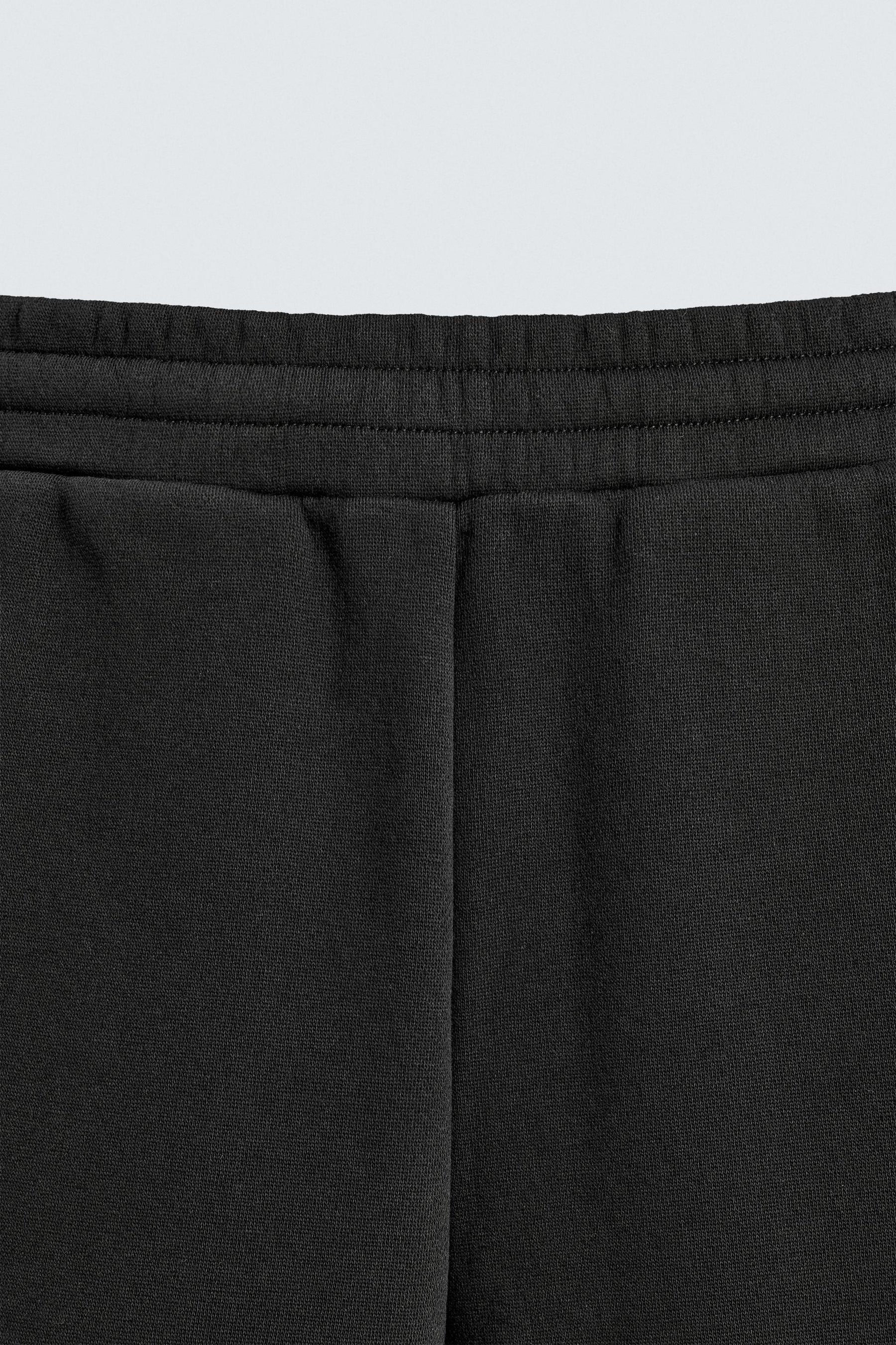 NEOPRENE-EFFECT PLEATED BALLOON FIT TROUSERS - Image 8