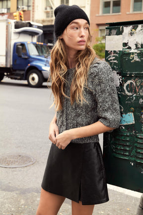 Strickjacke mit Puffärmeln