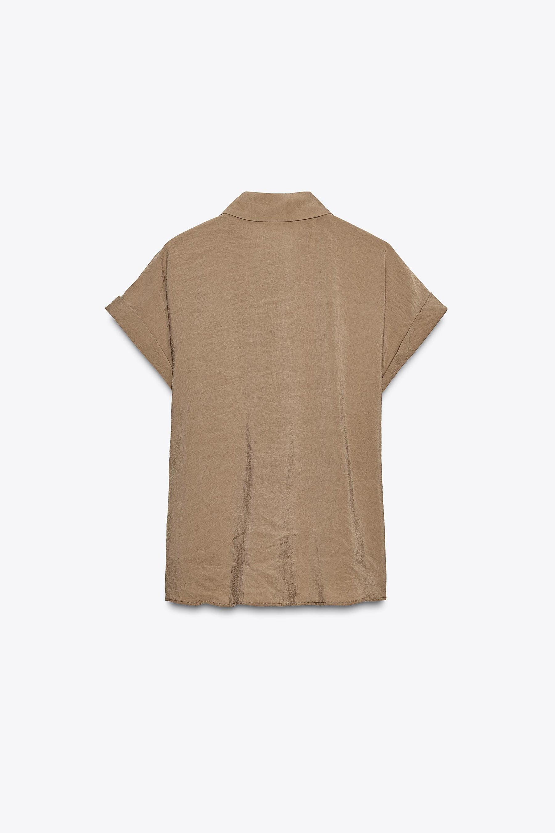 Kurzarm mit Knoten vorne