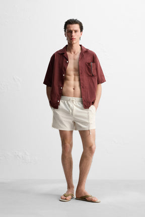 SEERSUCKER MID-LENGTH SWIMMING TRUNKS - Image 1