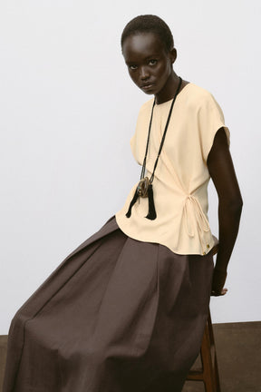 SCHNÜRTOUCH MIT FLÜGELNdem