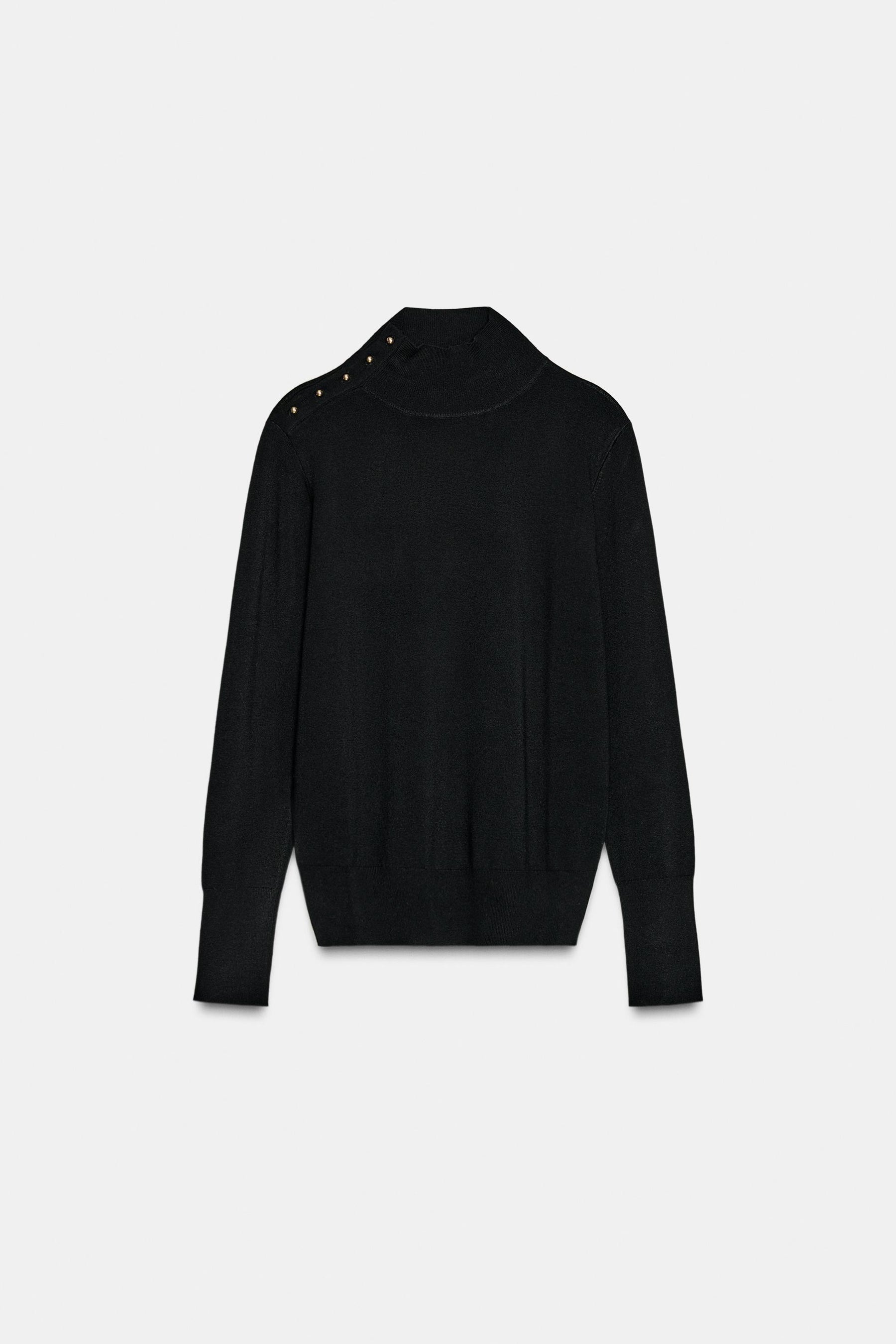 Strickpullover mit Knöpfen