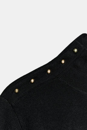 Strickpullover mit Knöpfen