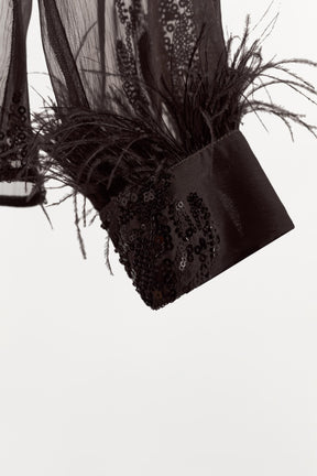 Paillettenbluse mit Federn