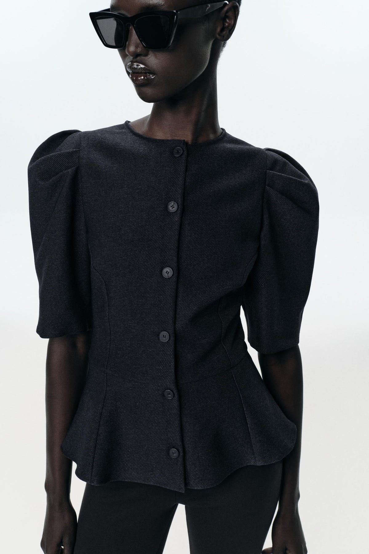 Peplum-Top mit Puffärmeln