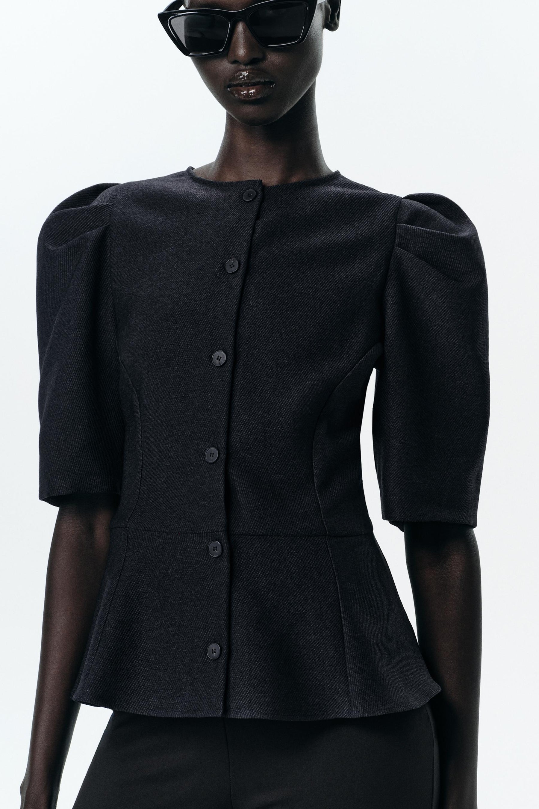 Peplum-Top mit Puffärmeln