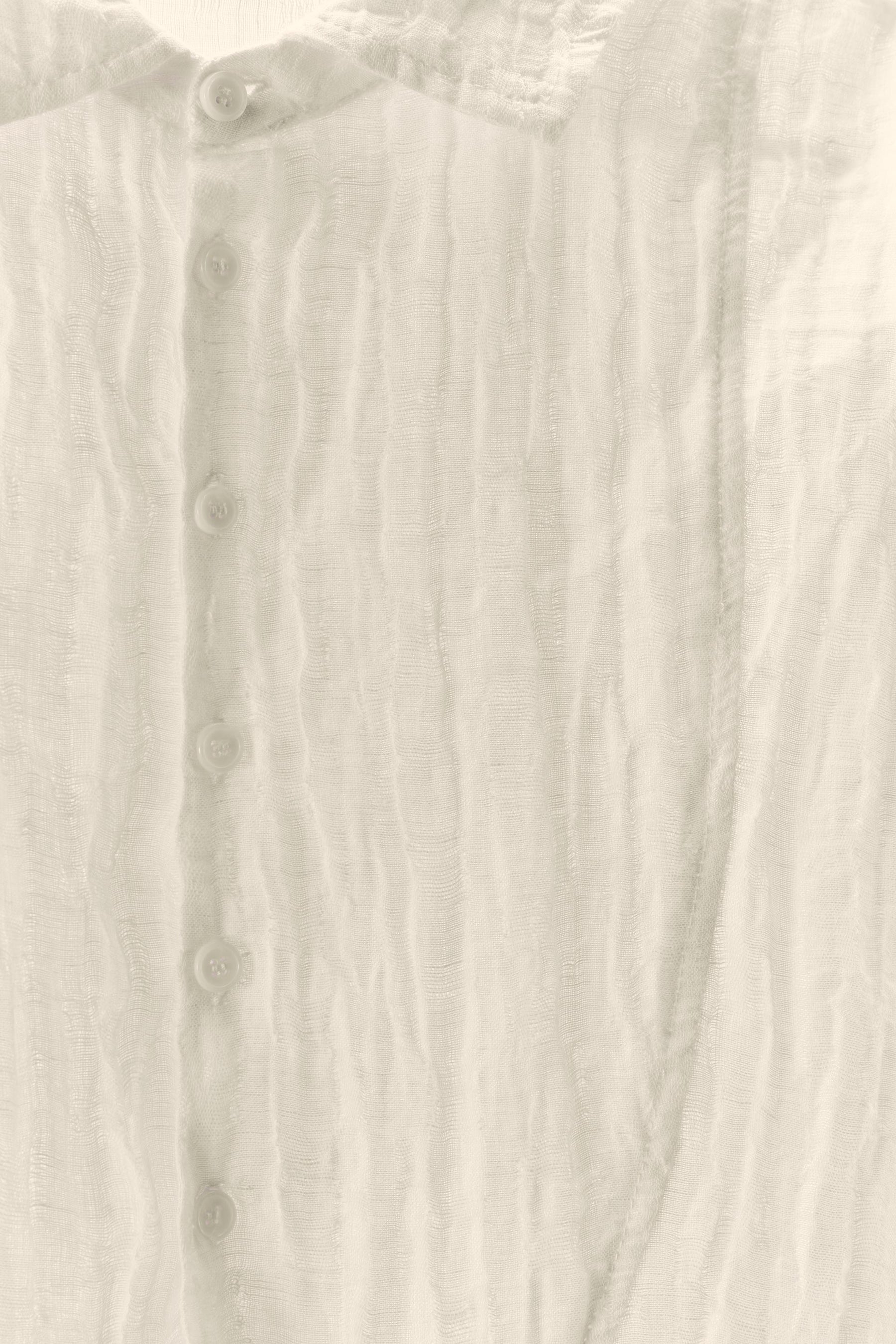 LIMITIERTE AUFLAGE LEINEN MIT KNOPFEFFER