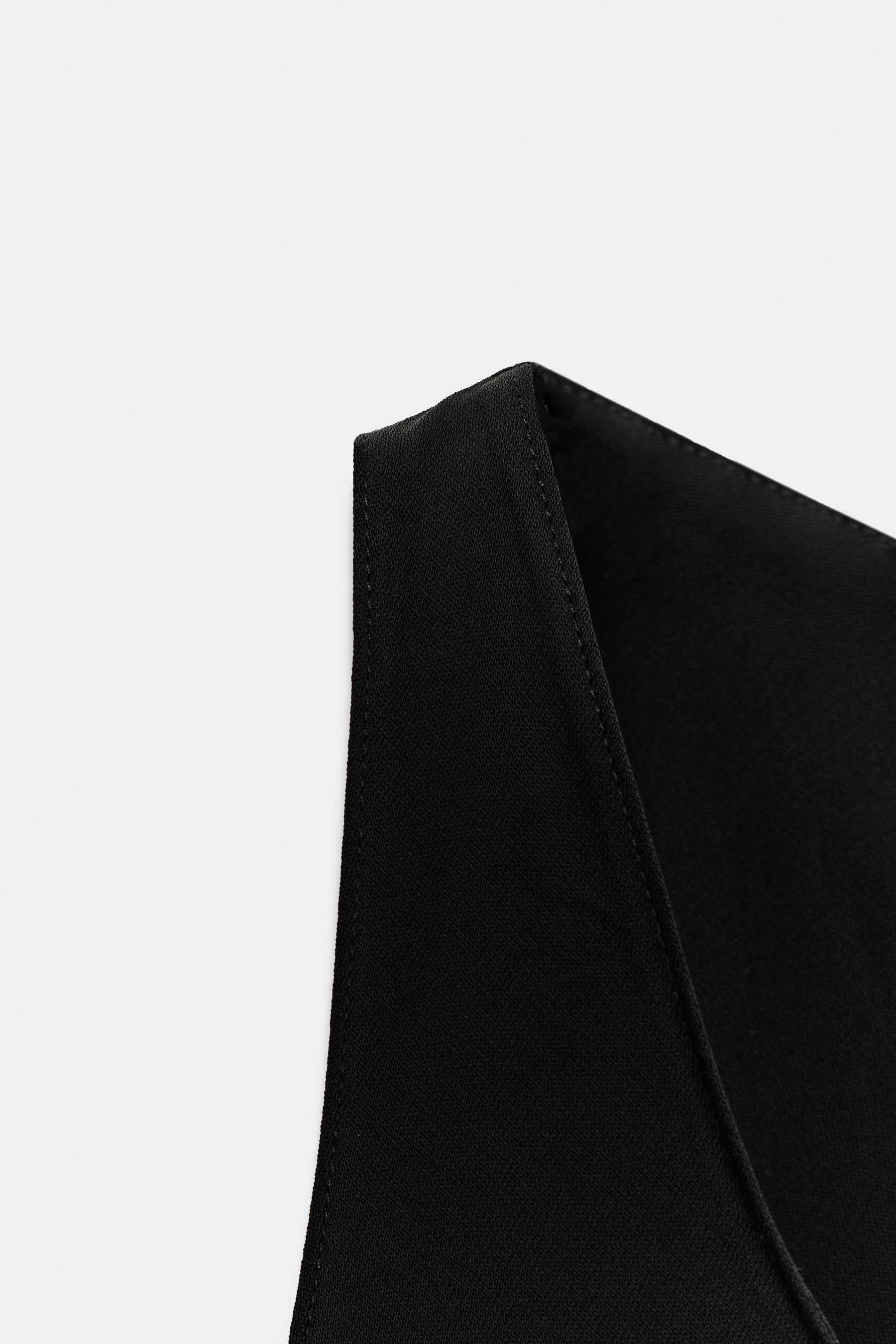 ASYMMETRISCHES MODE-TOP