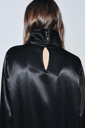 Asymmetrische lange Bluse