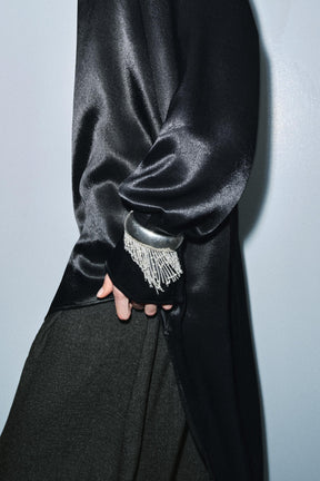 Asymmetrische lange Bluse