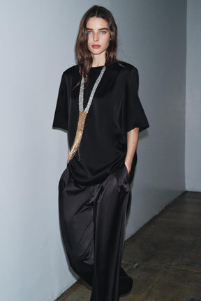 Oberteil mit gepolsterten Schultern