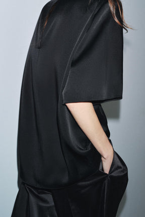 Oberteil mit gepolsterten Schultern