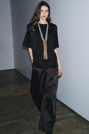 Oberteil mit gepolsterten Schultern