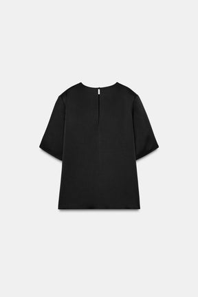 Oberteil mit gepolsterten Schultern