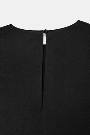 Oberteil mit gepolsterten Schultern