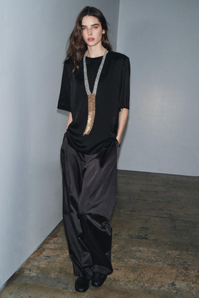 Oberteil mit gepolsterten Schultern