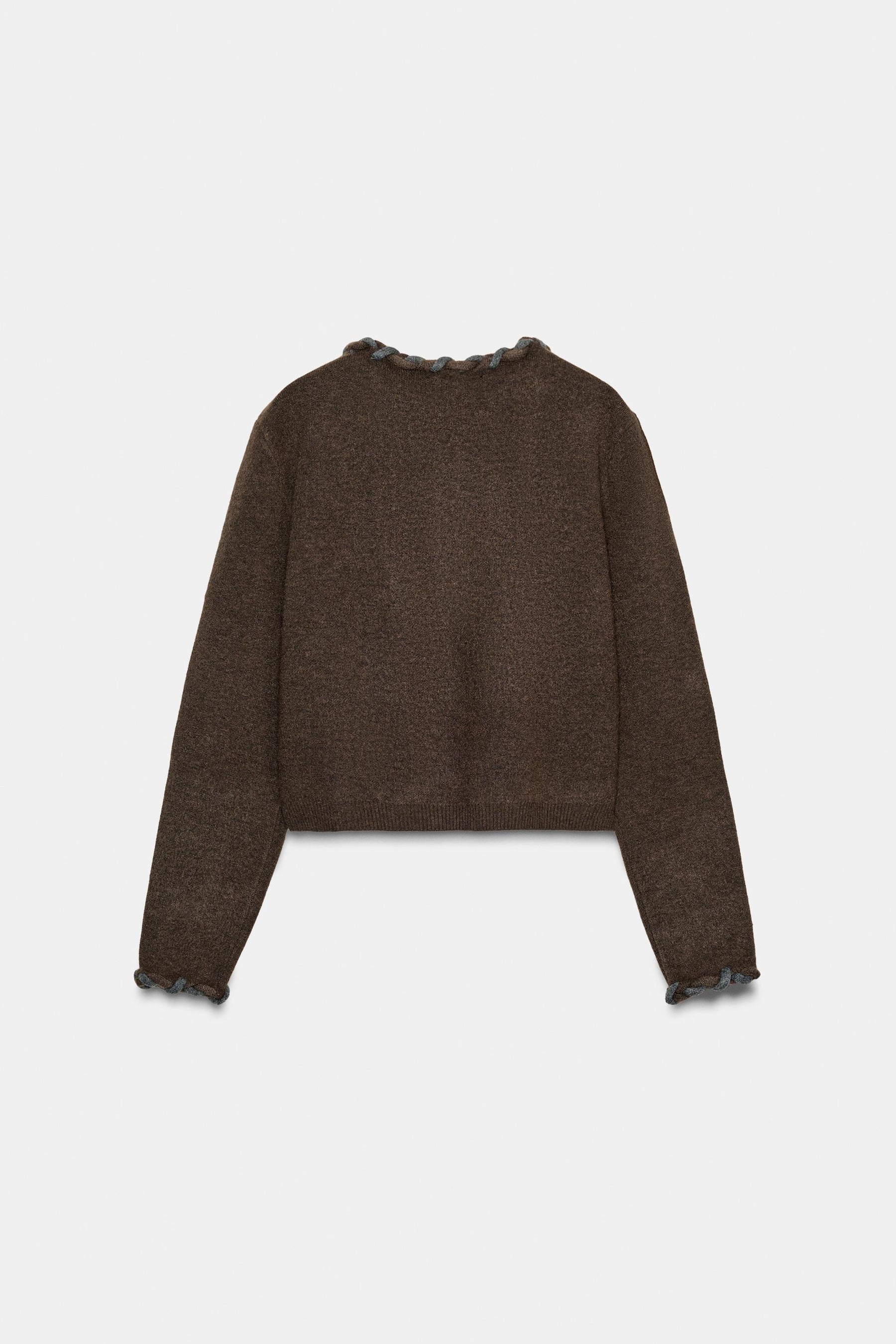 Strickjacke mit eingewebtem Besatz