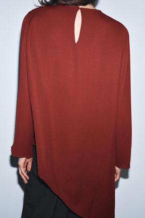 Asymmetrisches, fließendes Mode-Top