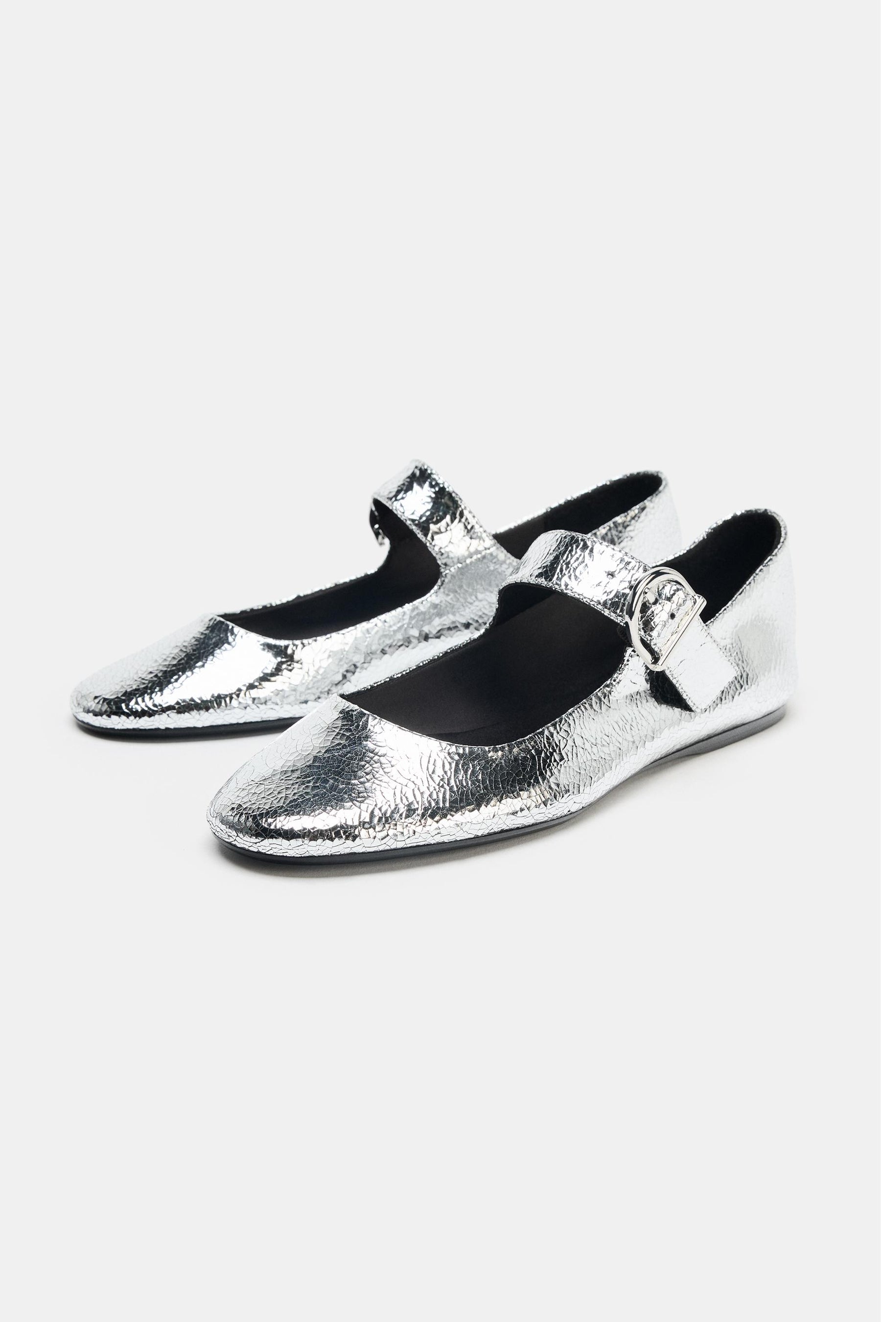Ballerinas aus Metallic-Leder