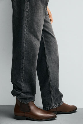 Spitz zulaufende Chelsea Boots