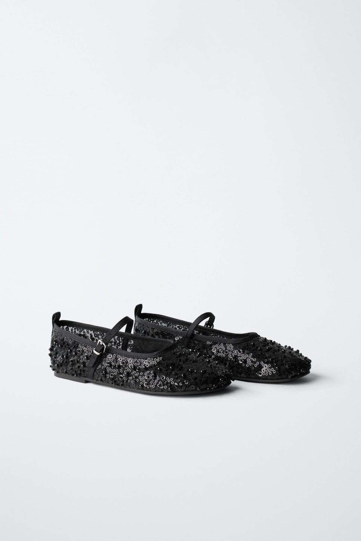 Ballerinas mit Perlenverzierung
