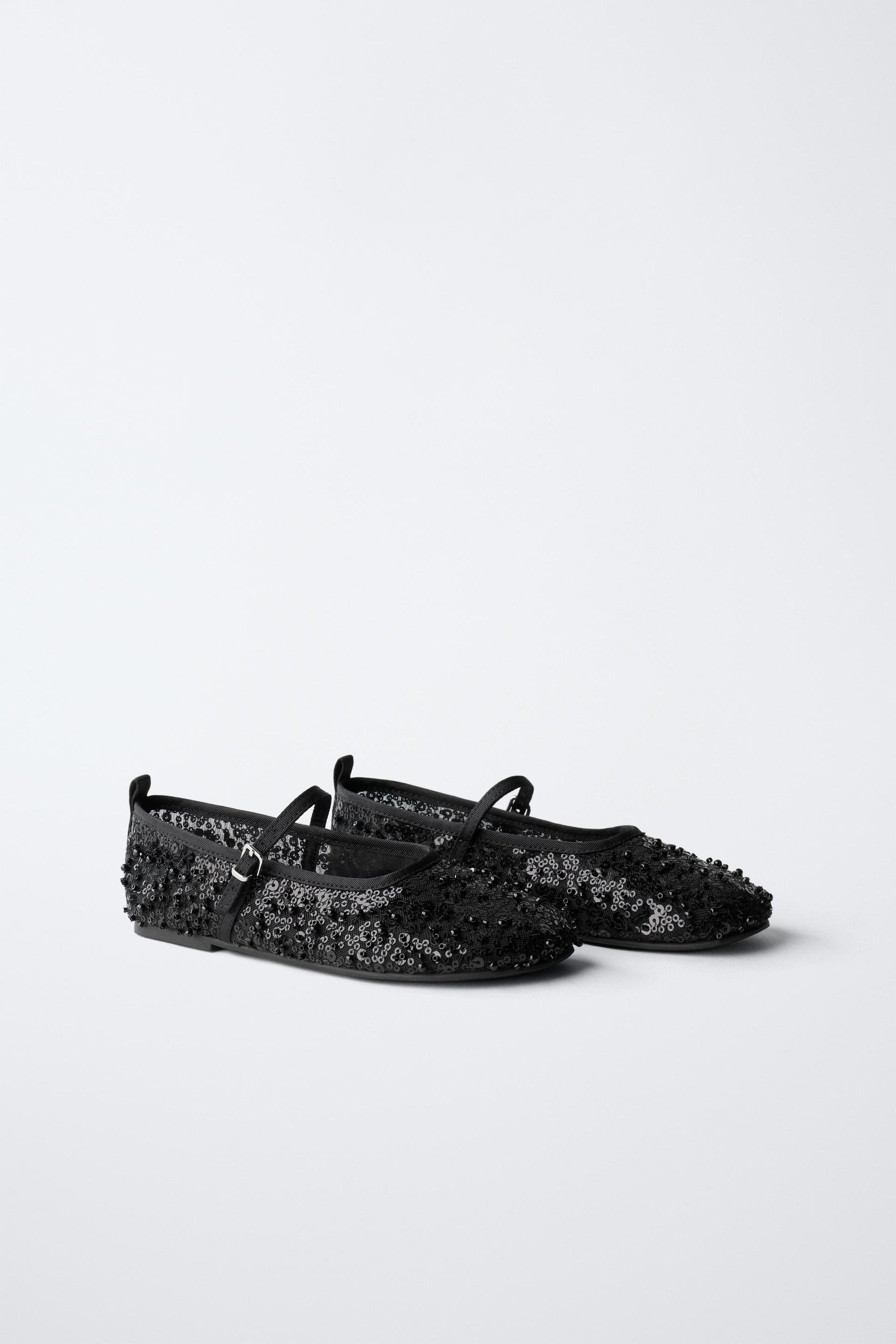 Ballerinas mit Perlenverzierung