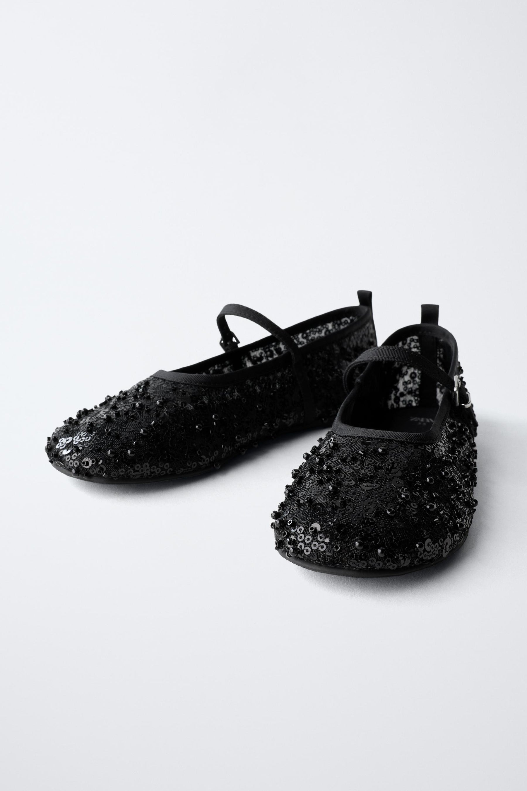 Ballerinas mit Perlenverzierung