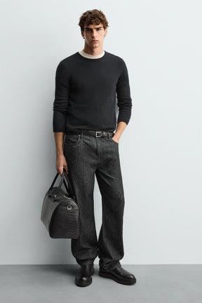 Reisetasche mit geprägtem Krokodilmuster