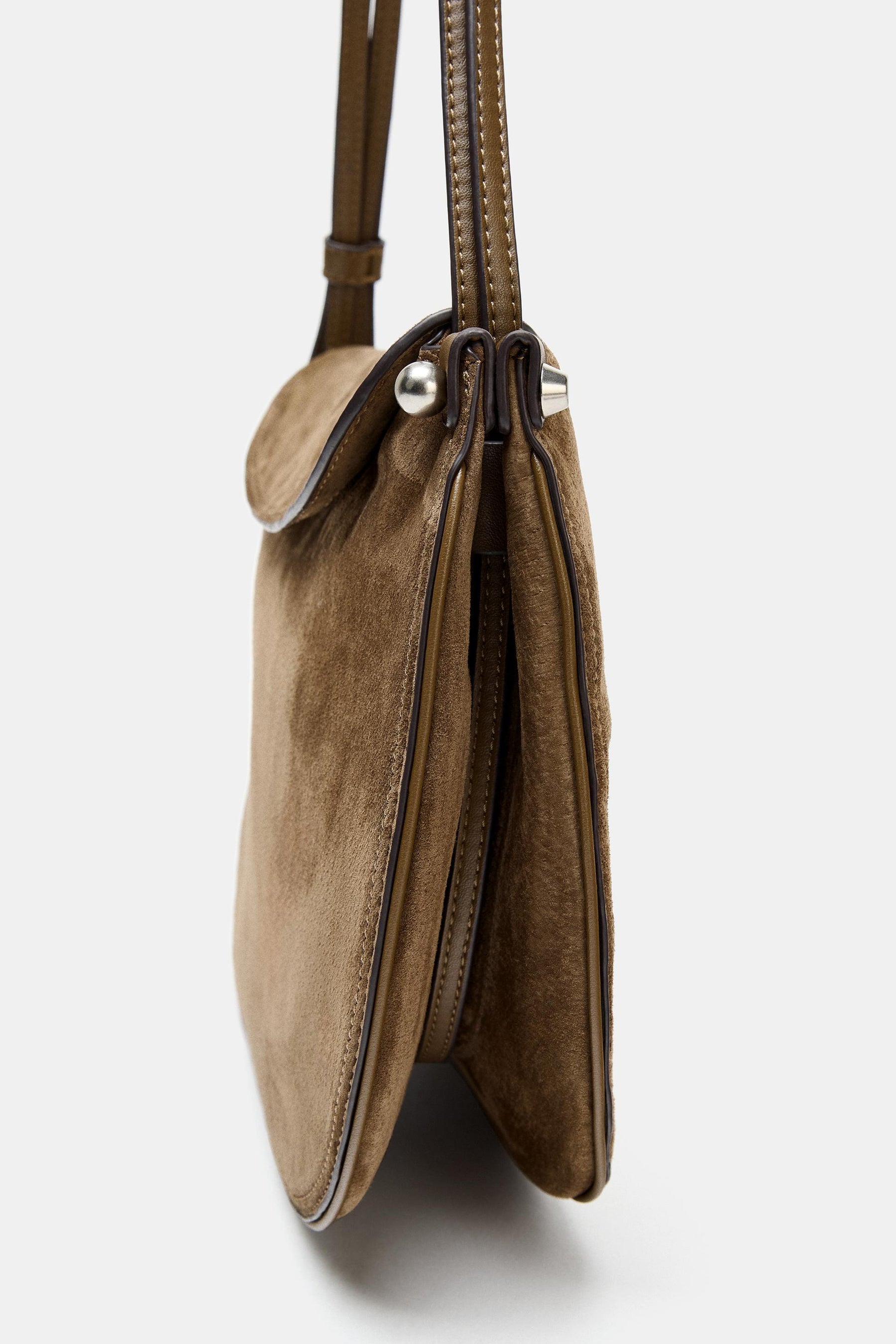 Leder-Klapphandtasche