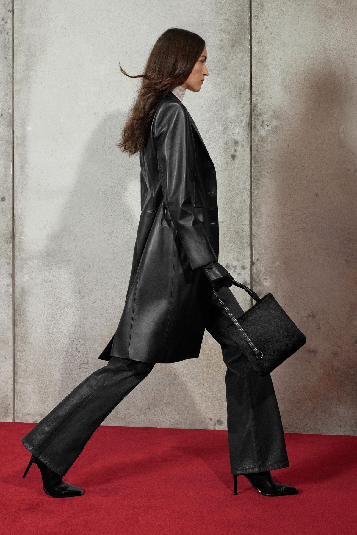 Gewachste Bootcut-Jeans mit niedrigem Bund